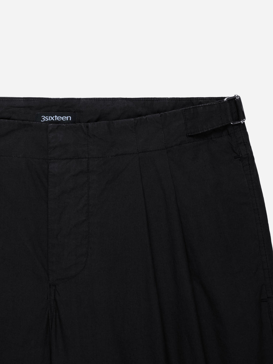 Black pants with a brand logo on a white background