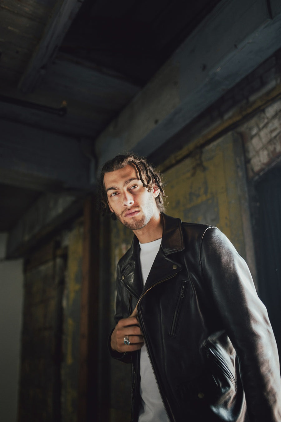 Man wearing leather jacket.