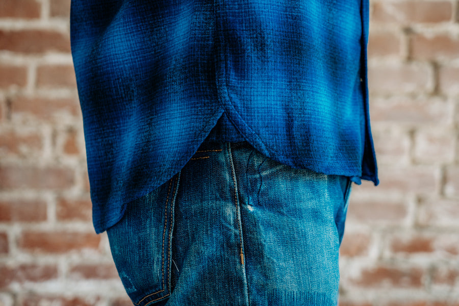 Close up shot of chainstitch runoff on over shirt.