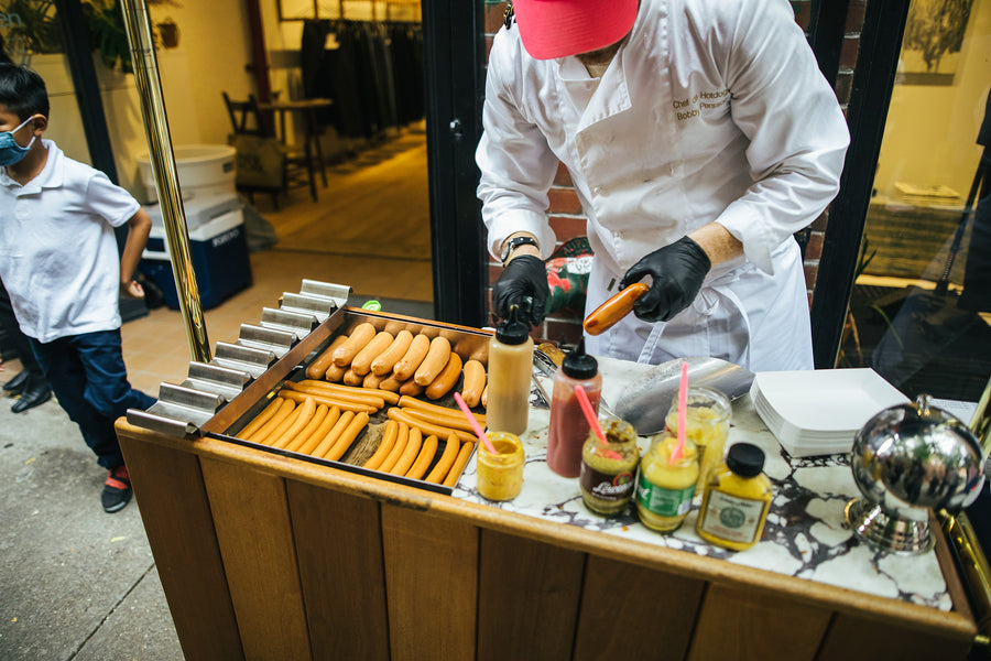 A cart full of hot dogs.