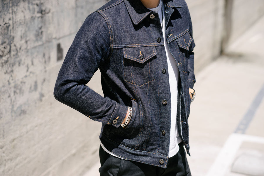 A front view of a 3sixteen denim jacket.