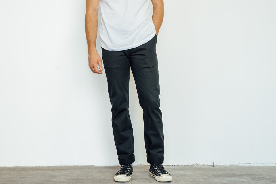 Man wearing black chino.