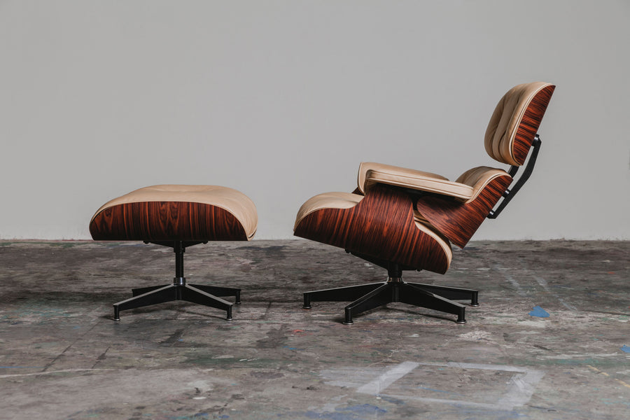 A finished vegetable tanned lounge chair sits in a concrete room.