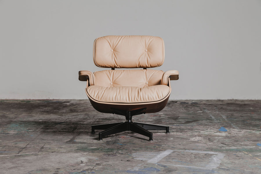 The vegetable tanned chair in a concrete room faces forward.