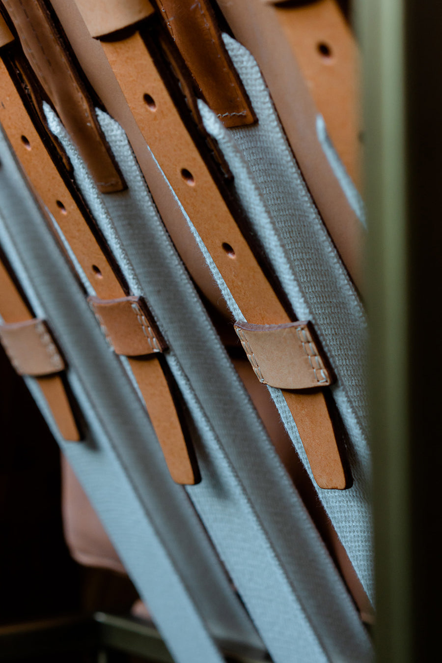 Belt strap webbing with natural veg tan accents. 