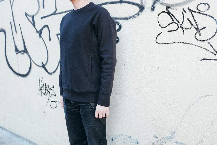 Side view of the crewneck.