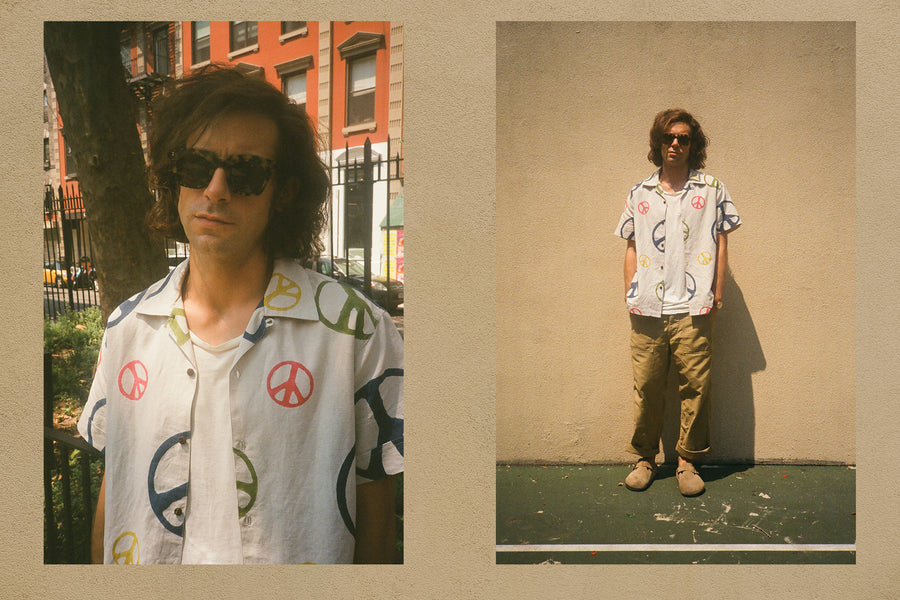 A diptych of a man wearing a colorful shirt with many peace signs printed all over them together with baggy pants.