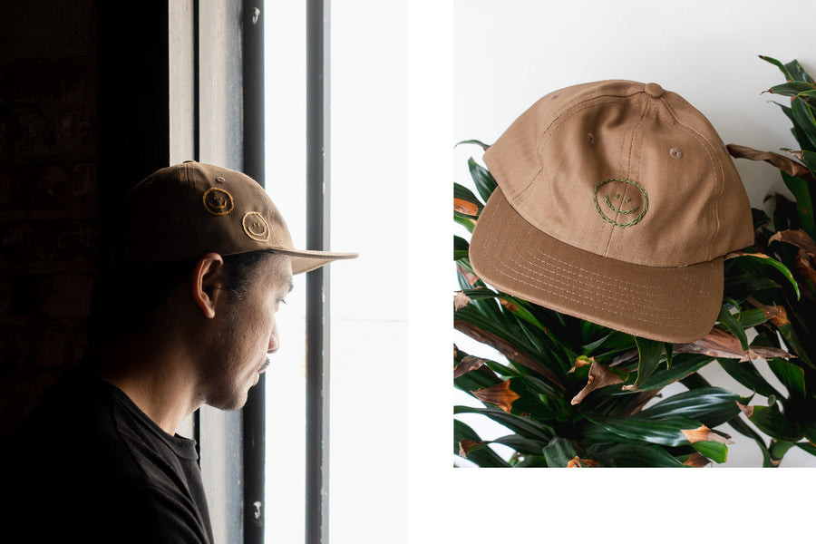 Smiley Caps by Jaime Wong.