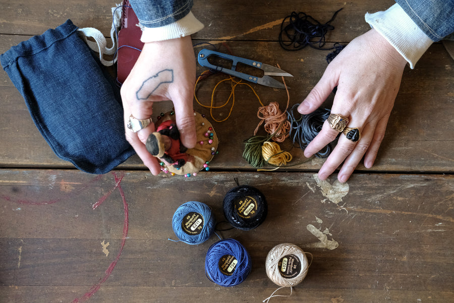 Smiley Caps by Jaime Wong.