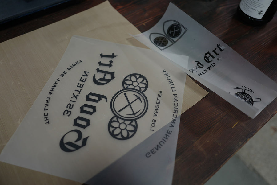 Paper printouts of the collaborative 3sixteen x Good Art graphics that were printed at the event.