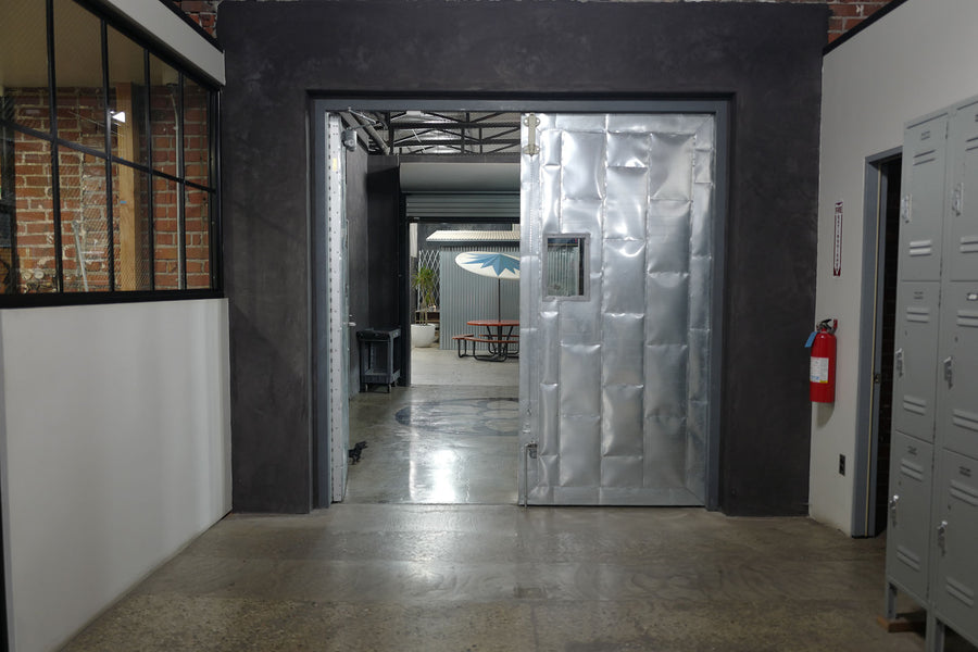A photo of metal doors at the Good Art foundry
