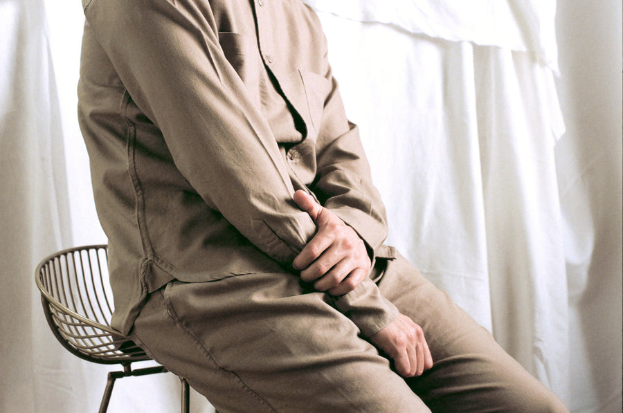 A closer look at the fabric on the tan shirt and pants.